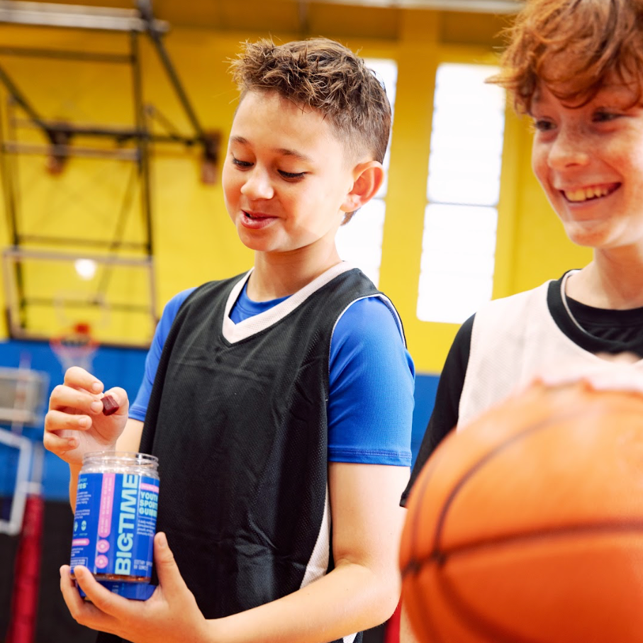 Boys playing basketball
